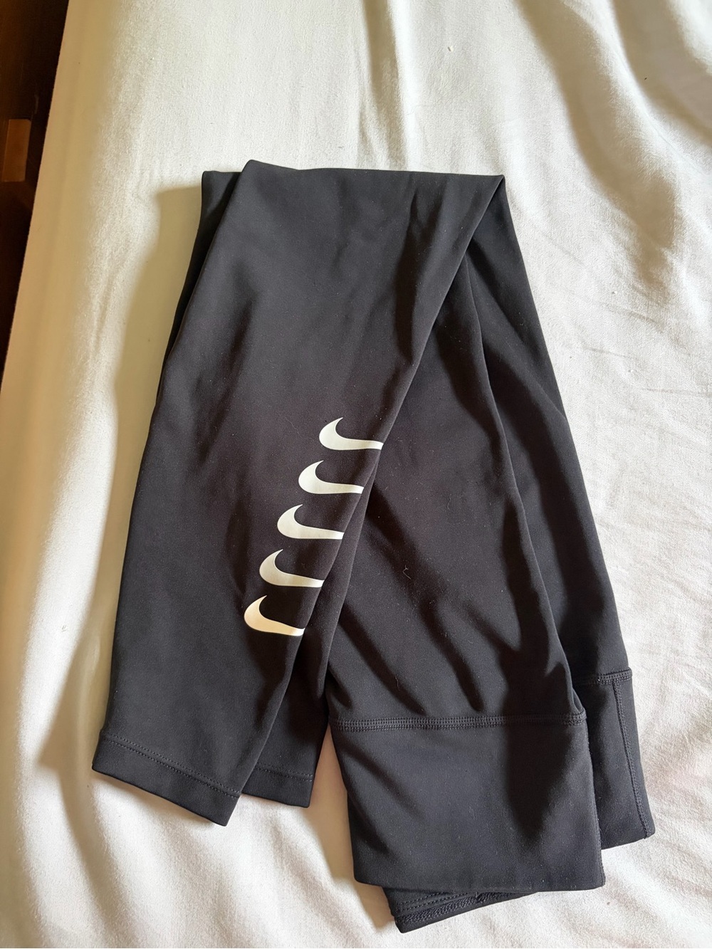 Nike Black Athletic Leggings with White Swoosh Detail